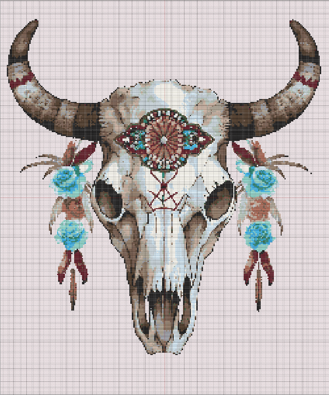 Free cross stitch pattern of a tribal-decorated buffalo skull with flowers, feathers, and beadwork in earthy tones and vibrant turquoise.