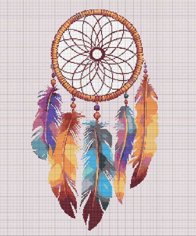 A vibrant free cross stitch pattern featuring a Native American dreamcatcher with colorful feathers, beadwork, and intricate center web.